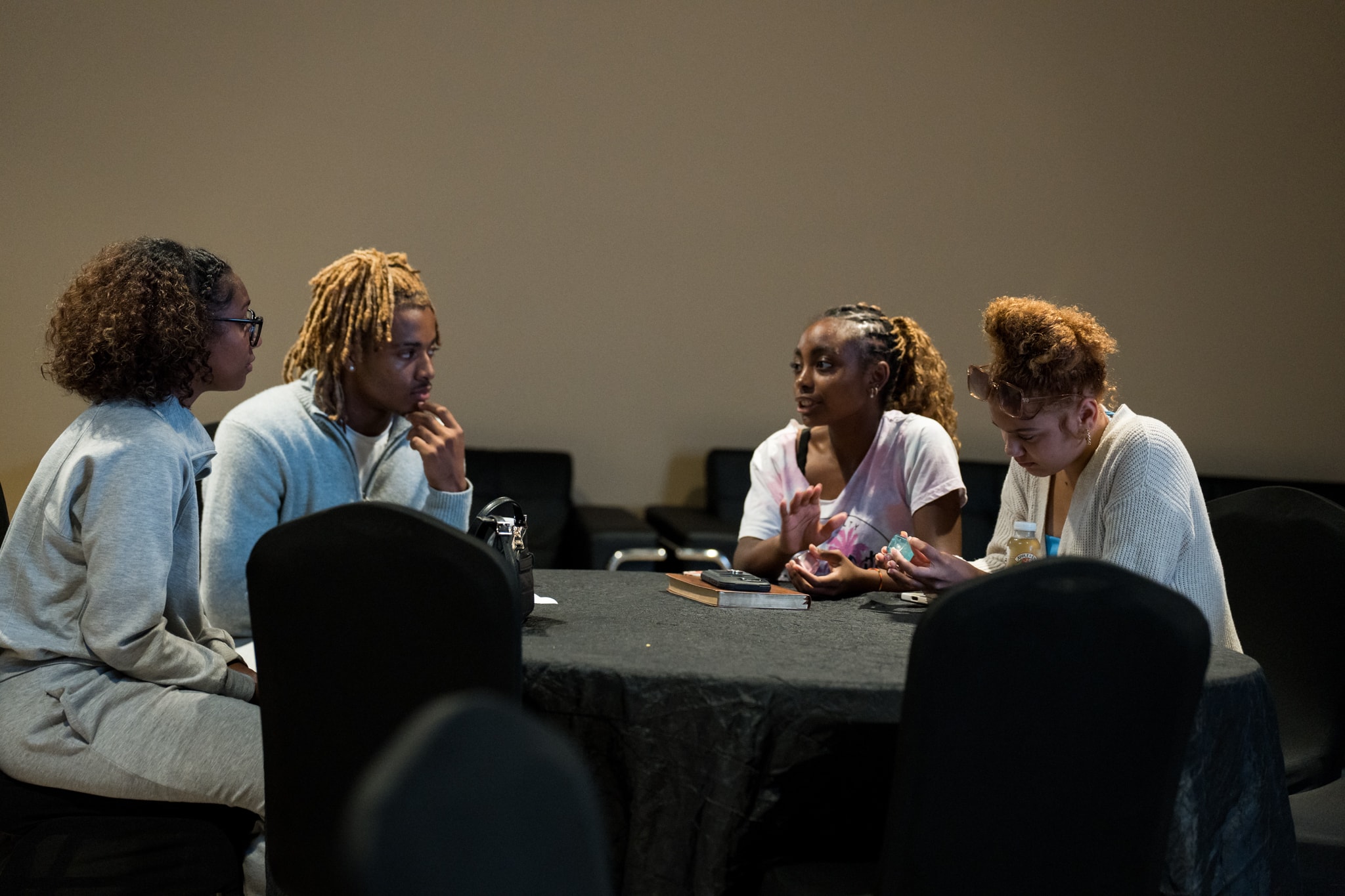 Youth in small group discussion